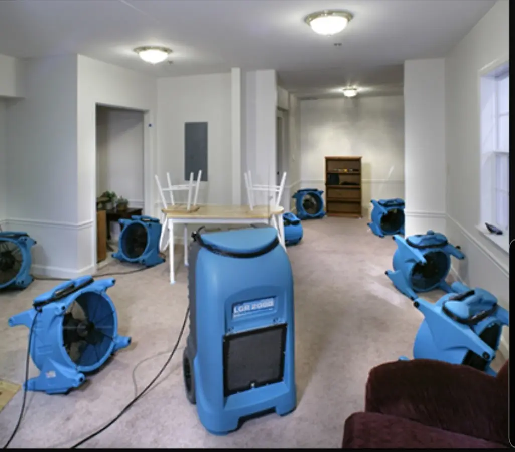 Air movers and dehumidifier setup for Water Damage Restoration in Farmington